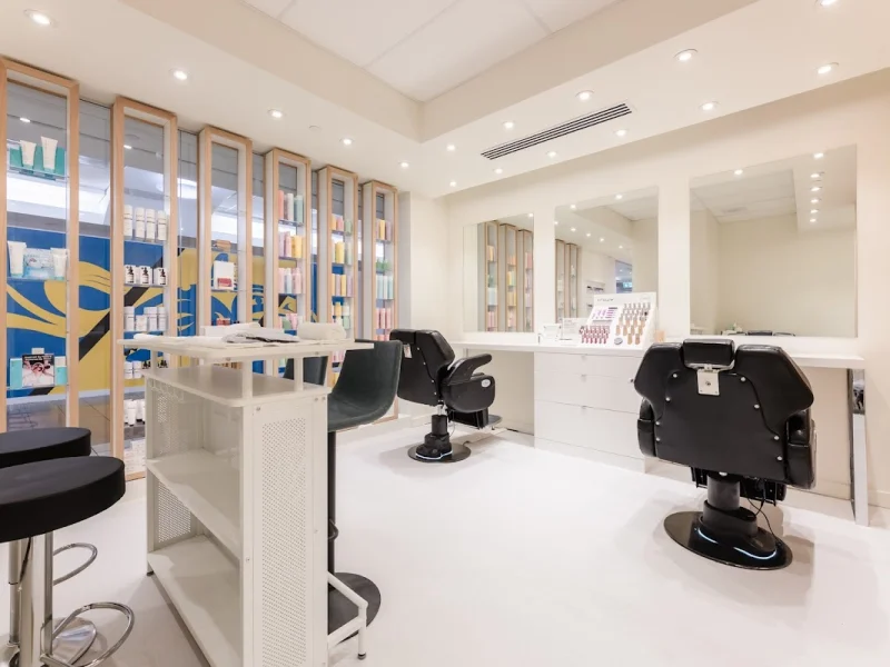 Bright spa treatment and beauty room with styling stations